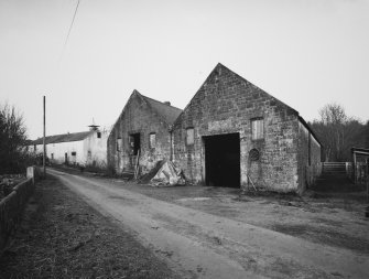 General view from SE of former bonded warehouse at E side of farm (now used as farm buildings).