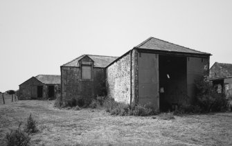 View of steading buildings adjacent to farmhouse from NE.