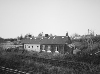 Elevated view from SE, during conversion of building.  A new station, a halt with shelter, has been built 150 metres to W of the old station building.