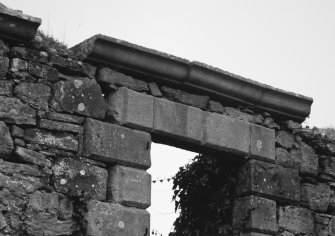 Detail of eaves and squareheaded window.