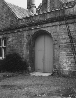 Detail of NW service courtyard archway.