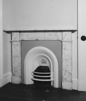 Interior.
First floor, NW elevation, room adjoining E corner, detail of fireplace.