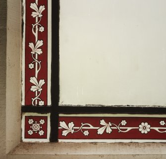 Detail of corner of stained glass window, N and S walls.