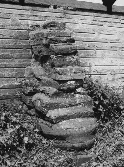 Detail of base of pier incorporated into W buttress on S side of Dutch barn in Kirkstyle steading.