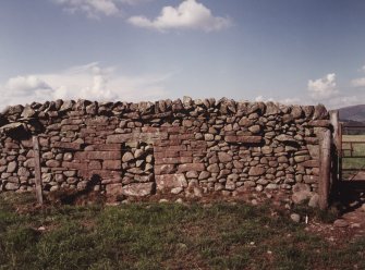 Detail of stones built into nearby wall.