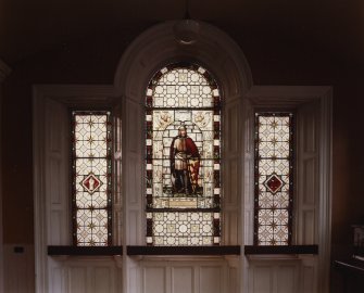 Interior.
First floor, hall, detail of SW stained glass window.
