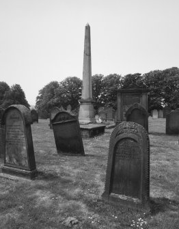 View of obelisk in churchyard from NE.