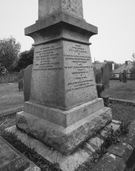 Detail of inscription on two sides of base of obelisk.