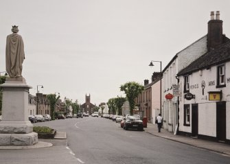 View showing setting in High Street from N