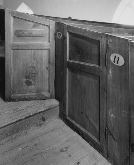 Interior. Detail of gallery pews with nameplate " ELSHIESHIELDS"