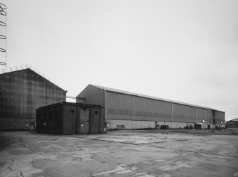 View from E of Bay 1 [Plate Fabrication & Cylinder Fabrication Shop], with electrical substation building in foreground
