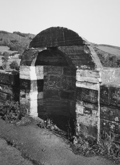 Detail of arched shelter on bridge.