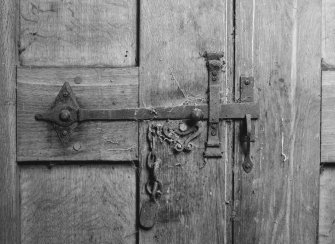 Interior.
Detail of W door lock and handle.