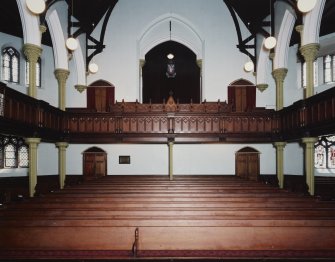 Interior. View from NW from the platform towards the gallery and the magistarates pew