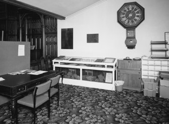 Interior. View of museum area in side aisle with