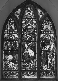 Interior. W transept stained glass window by Powell Bros 1884 The Good Samaritan