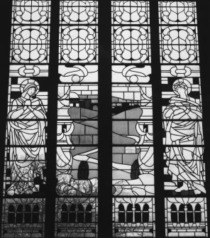 Interior.
Detail of lower half of stained glass window in N transept.