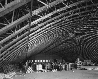 Interior.
General view from SW, showing internal curved sub-structure of lattice-steel girders supporting outer shell.