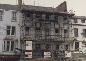View of entrance front under scaffolding.