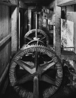 Interior.
Detail of remains of geared drives for 3 pairs of stones.