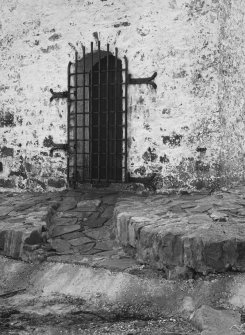Detail of iron door and plynth.