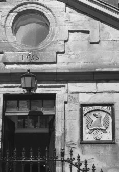 Detail of heraldic plaque and 1735 datestone on E elevation.