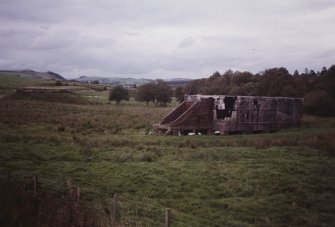 View.  Single exposed magazine at S end of site.