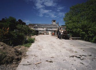 View from E showing part of the slipway with boathouse/sawmill with observation tower.