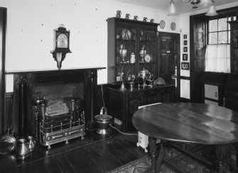 Interior, view of ground floor hall from North West showing black marble fireplace c.1820