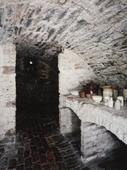 Interior, view of lower ground floor vaulted cellar under entrance court