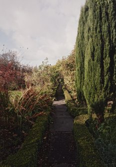 View of paved axial garden path