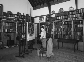 Interior, view of studio from North West showing bookcases and manequin representing Hornel at work