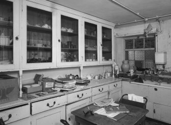 Interior, view of lower ground floor china pantry with original china cupboards