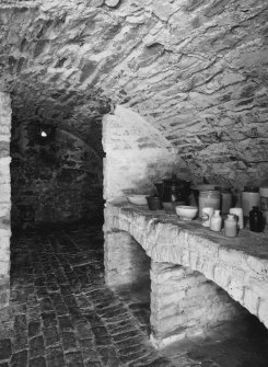 Interior, view of lower ground floor vaulted cellar under entrance court