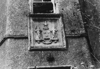Detail of heraldic panel over principal entrance.
