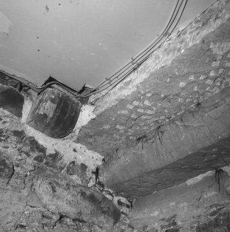 Ground floor, detail of underside of stair with corbel