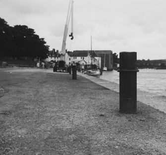 General view showing cement filled iron pipes in use as bollards on upstream section.