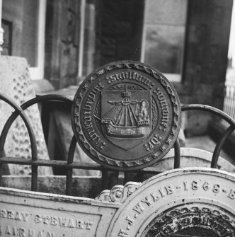 View of plaque bearing burgh seal with motto 'Sigillum Comune de Kyrkuibruy.'