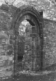 View of roundheaded doorway from NW.