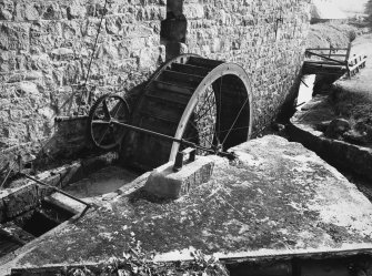 Detail of threshing barn waterwheel and lade.