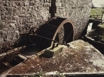 Detail of threshing barn waterwheel and lade.