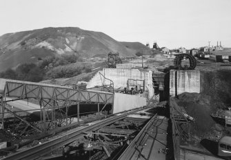 Blairhall Colliery.
Distant view of pithead and bing, with surface mine emerging in foreground.
undated