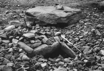 Excavation, view of cist and capstone