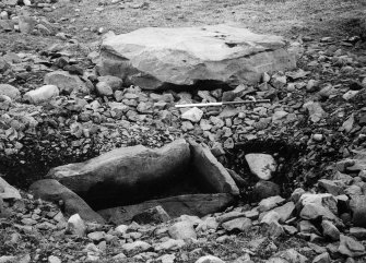 Excavation, view of cist and capstone