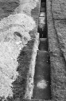 Excavation 1964-5
Section through outer N ditch and aligned systems of pits looking S