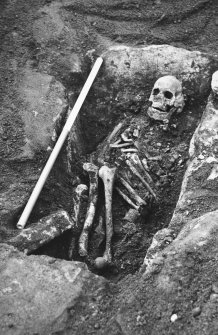 View of Cist 3 with inhumation butrial in situ.
