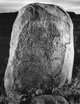 View of inscribed east face of the Cat Stane.