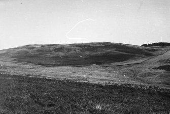 Distant view of road crossing N end of valley, from S.