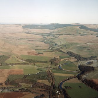 Oblique aerial view of Liddesdale looking along the Liddel Water and Hermitage Water, taken from the SW.