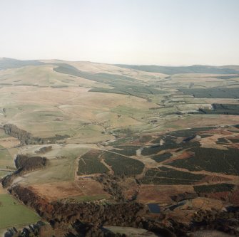 Oblique aerial view of Liddesdale looking along the Liddel Water and Hermitage Water, taken from the SSW.